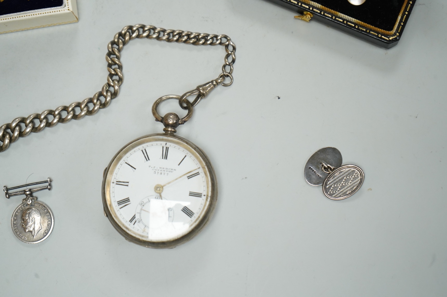 A late Victorian silver open faced lever pocket watch, with graduated silver curb link albert, together with dress studs, a pair of sterling cufflinks, a medal, etc.